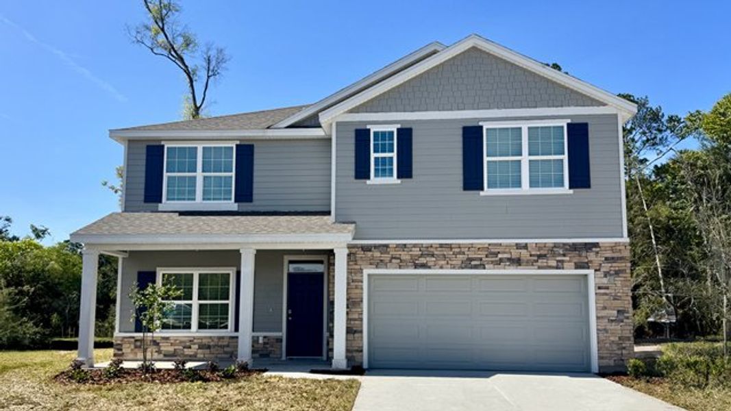 Representative exterior photo of a completed home built from the HAYDEN by D.R. Horton in Oaks Preserve, Gainesville, FL (Image 1). Representative exterior photo of a completed home built from the HAYDEN by D.R. Horton in Oaks Preserve, Gainesville, FL (Image 1).