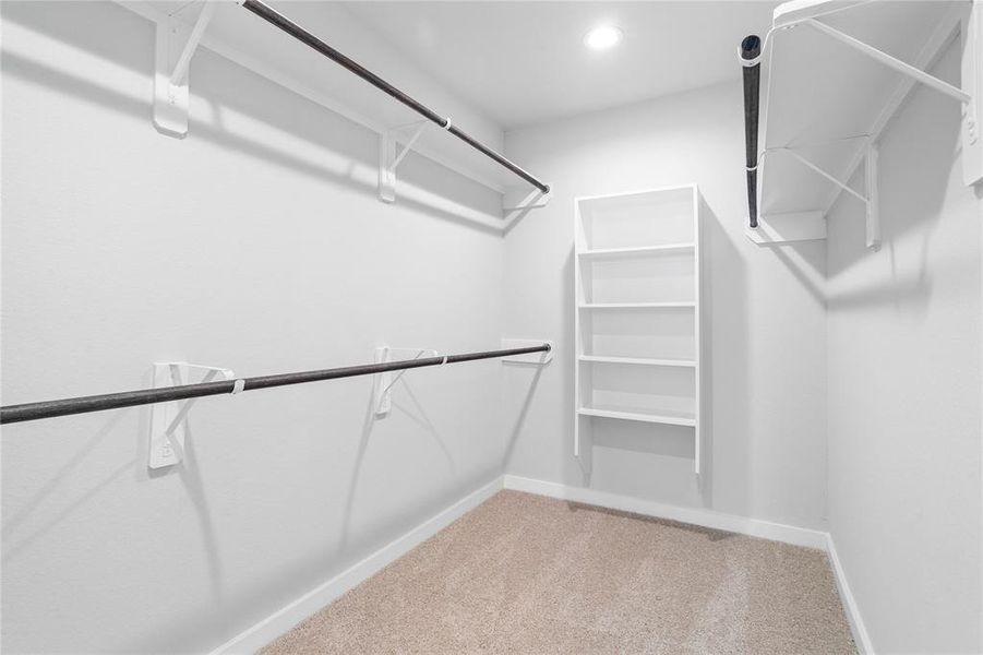 Look at this immaculate closet! With high shelving, multiple rows to hang clothing, you are sure to have enough room for all your belongings!