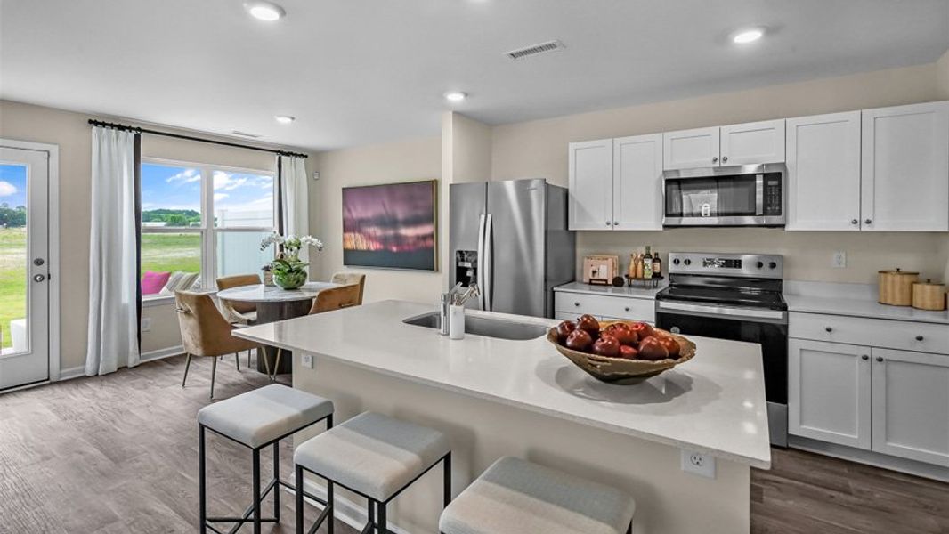 Furnished interior view inside a new home in North Village Townes, Greensboro (Image 8).