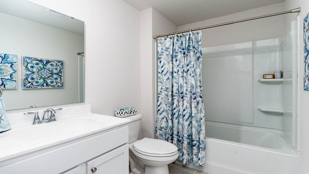 Furnished interior view inside a new home in Sandridge Park, Little River (Image 14).