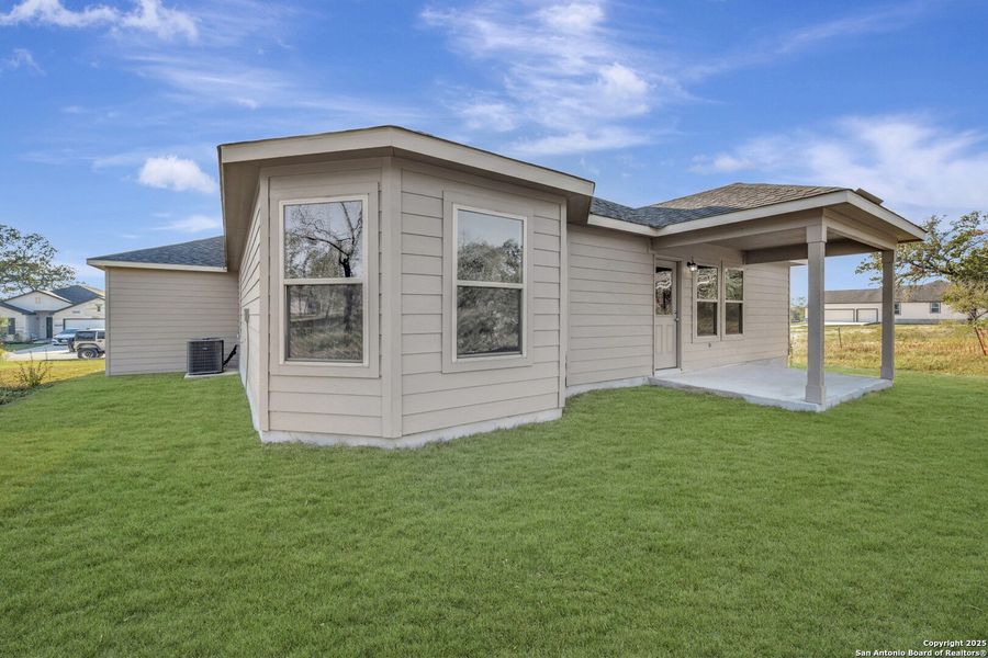 Exterior details and patio area of a home in Jordan's Ranch, San Antonio (Image 3). Exterior details and patio area of a home in Jordan's Ranch, San Antonio (Image 3).