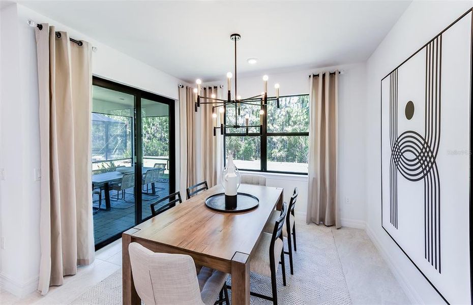 Furnished interior view inside a new home in The Strand at Cedar Grove, North Port (Image 11).