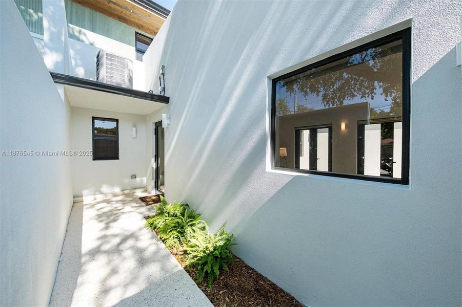 Exterior details and patio area of a home in , Miami (Image 4). Exterior details and patio area of a home in , Miami (Image 4).