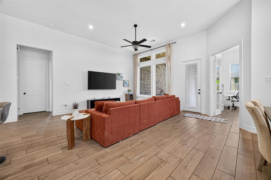 Furnished interior view inside a new home in , Iowa Colony (Image 27).
