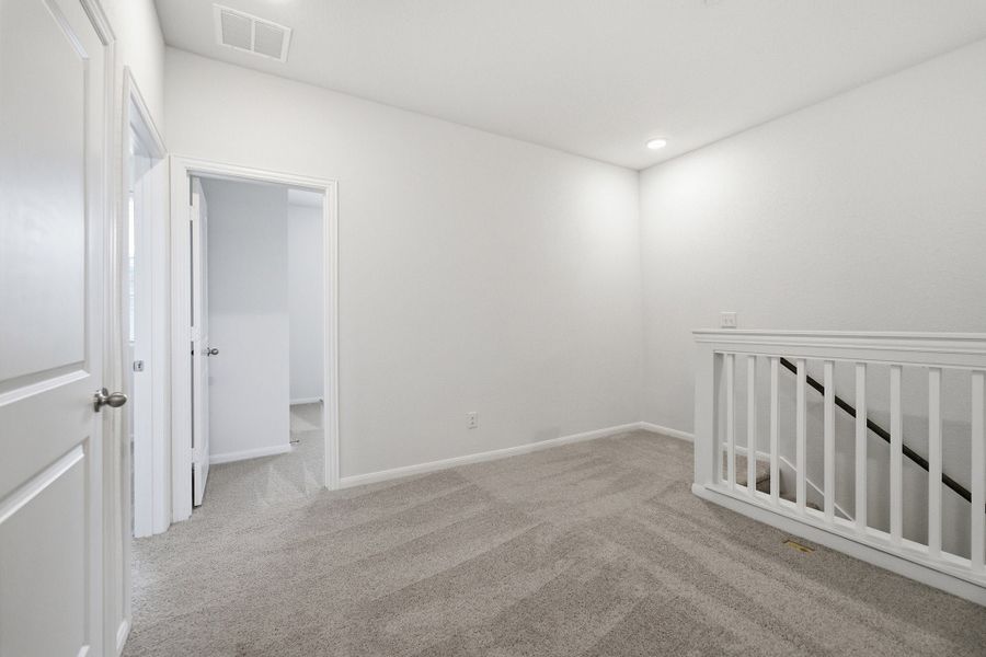 Representative unfurnished interior of a home built from the Mies by CastleRock Communities in Municipal Drive Townhomes, Leander (Image 20). Representative unfurnished interior of a home built from the Mies by CastleRock Communities in Municipal Drive Townhomes, Leander (Image 20).