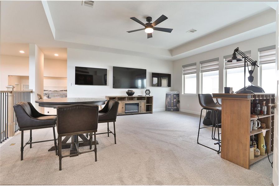 Furnished interior view inside a new home in Elyson, Katy (Image 36).