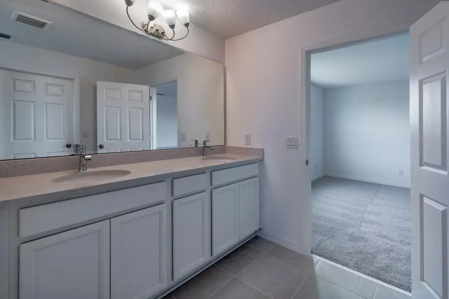 Modern Primary Bathroom with Stylish Features in Central Florida House