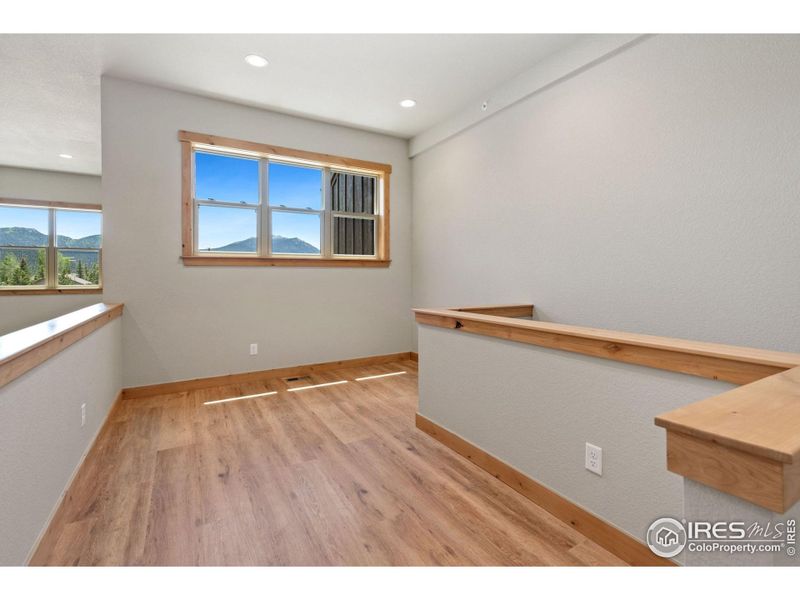 Upper level loft, ideal for flex or office space