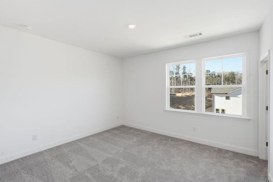 Spacious, unfurnished interior of a new home in Bailey Fence, Dacula (Image 31).