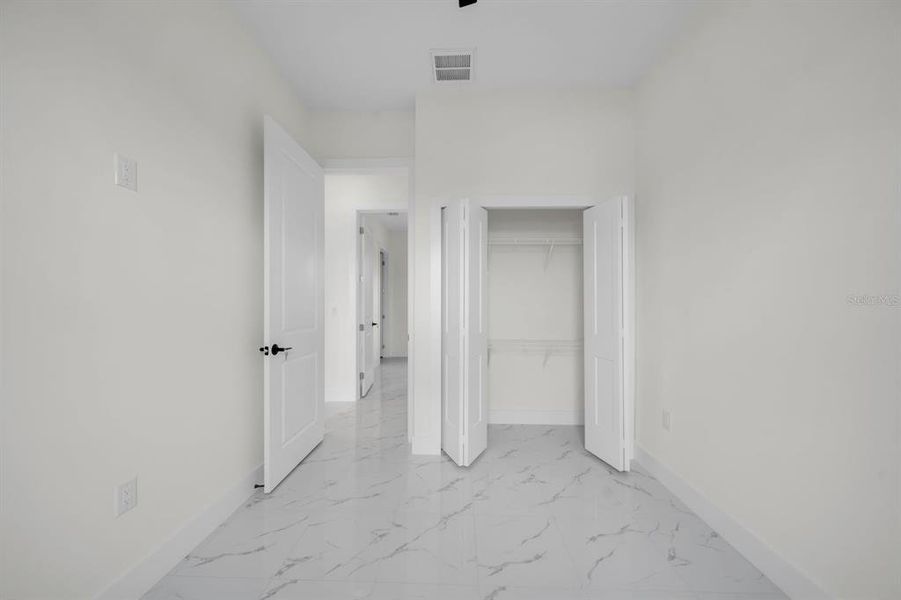 Spacious, unfurnished interior of a new home in , Lehigh Acres (Image 28). Spacious, unfurnished interior of a new home in , Lehigh Acres (Image 28).