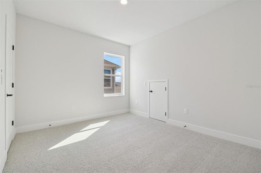 Spacious, unfurnished interior of a new home in Waterset Tradition Series, Apollo Beach (Image 33).