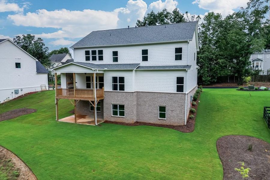 Front exterior of a new home in , Sugar Hill, GA, highlighting curb appeal (Image 26). Front exterior of a new home in , Sugar Hill, GA, highlighting curb appeal (Image 26).