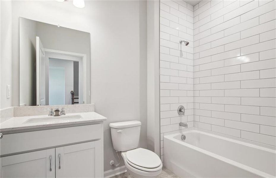 Furnished interior view inside a new home in Watermist at Mirror Lake, Villa Rica (Image 14).