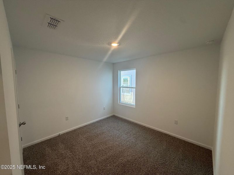 Spacious, unfurnished interior of a new home in The Arbors, Jacksonville (Image 40).