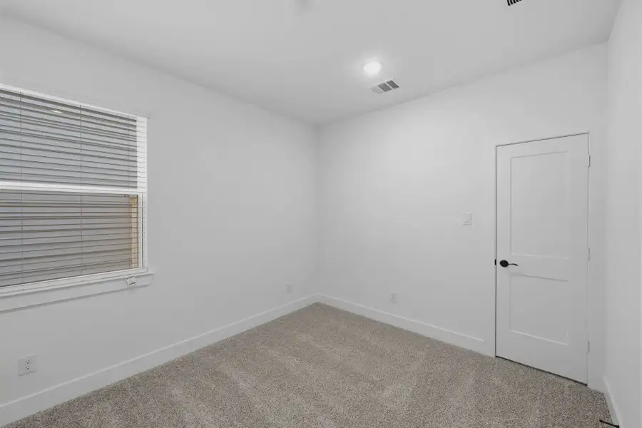 Representative unfurnished interior of a home built from the Margaux by Chesmar Homes in Bridgeland Chateau, Cypress (Image 46).