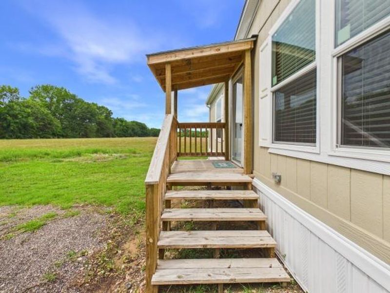 Exterior details and patio area of a home in , Murchison (Image 19).