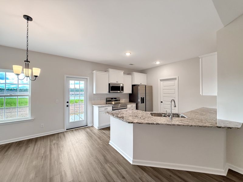 Furnished interior view inside a new home in The Village at Sassafras, Allenhurst (Image 9).