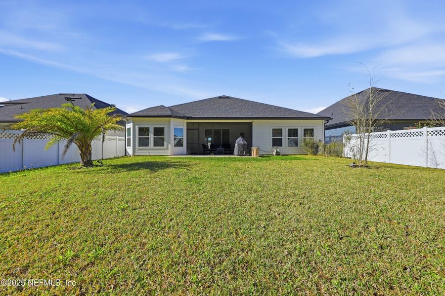Exterior details and patio area of a home in Silver Landing at SilverLeaf, St. Augustine (Image 30).