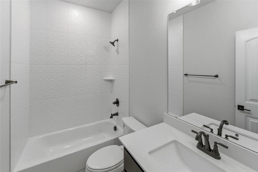Full bath with  shower combination and vanity