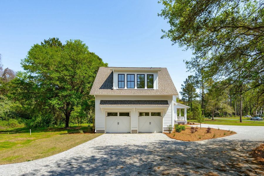 Front exterior of a new home in , Johns Island, SC, highlighting curb appeal (Image 31).