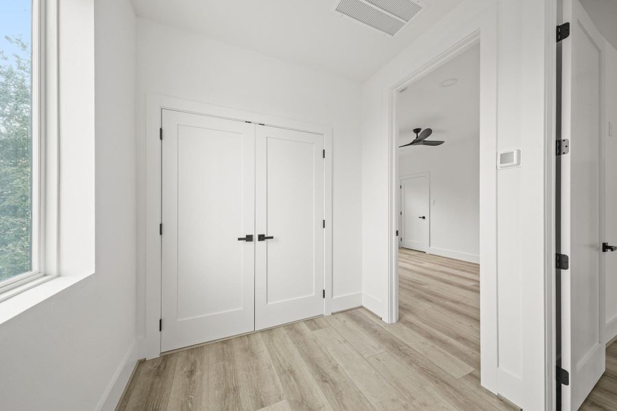 Centrally located at the top of the third floor stairwell, the utility room is accessed through elegant double doors and is designed to accommodate a full size washer and dryer. Centrally located at the top of the third floor stairwell, the utility room is accessed through elegant double doors and is designed to accommodate a full size washer and dryer.