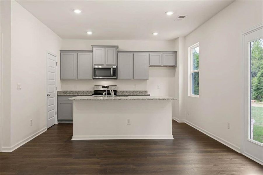 Furnished interior view inside a new home in The Reserve at Calcutta, Stockbridge (Image 7).