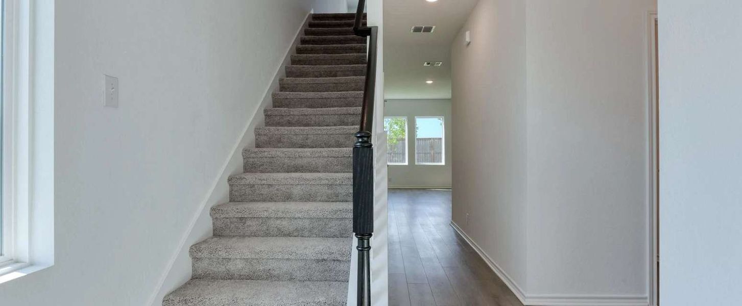 Representative unfurnished interior of a home built from the Dunlap by Ashton Woods in Meadows at Hennersby Hollow 40's, San Antonio (Image 12).