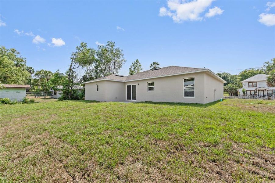 Exterior details and patio area of a home in , Orange City (Image 3).