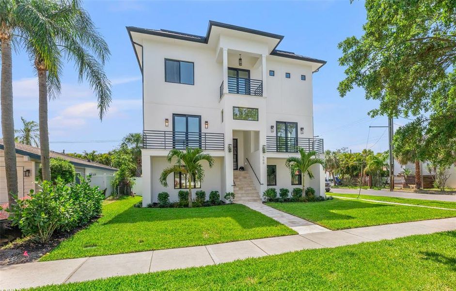 Front exterior of a new home in , Tampa, FL, highlighting curb appeal (Image 2).
