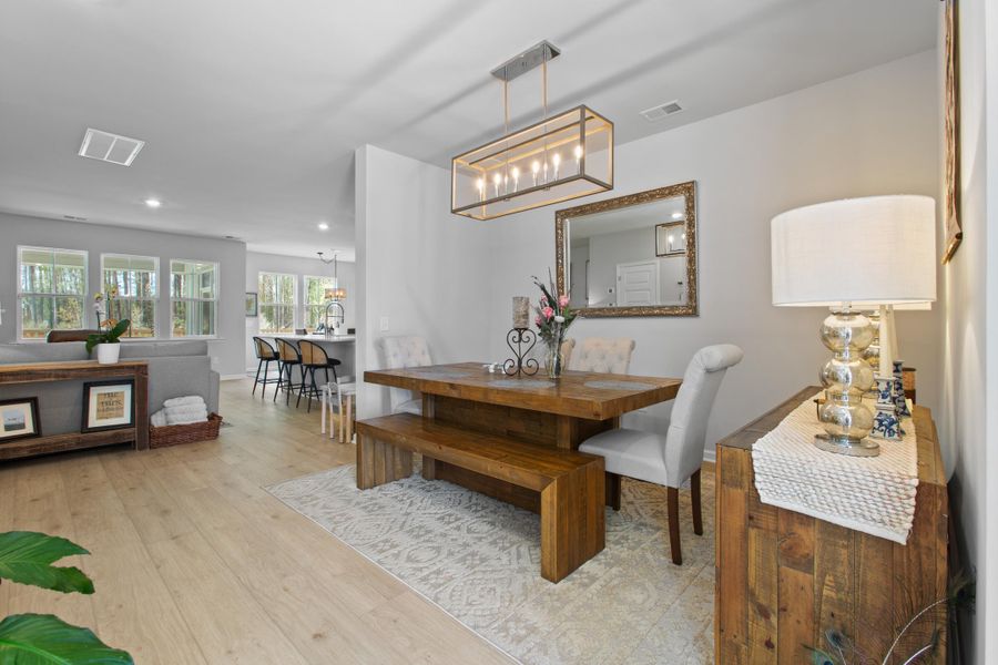 Furnished interior view inside a new home in Sweetgrass at Summers Corner, Summerville (Image 5).