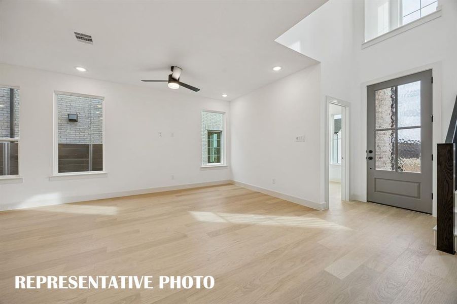 Your new family room offers lovely flooring with plenty of windows to fill the space with natural light. REPRESENTATIVE PHOTO Your new family room offers lovely flooring with plenty of windows to fill the space with natural light. REPRESENTATIVE PHOTO