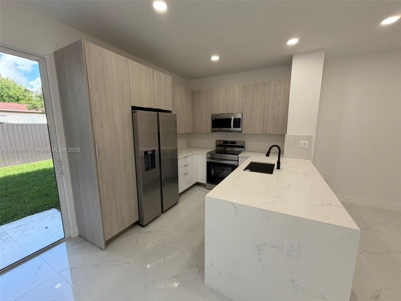 Furnished interior view inside a new home in , Miami (Image 12). Furnished interior view inside a new home in , Miami (Image 12).