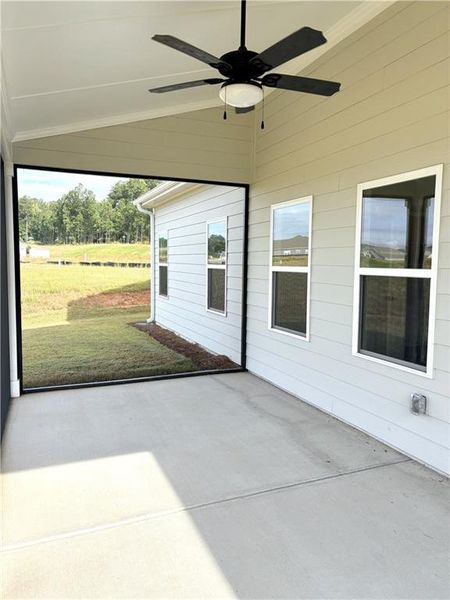 Exterior details and patio area of a home in Heritage Pointe at The Georgian, Villa Rica (Image 3).
