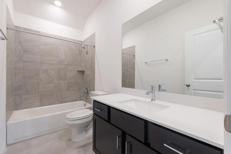 Furnished interior view inside a new home in The Colony - 50', Bastrop (Image 13).