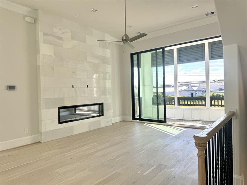 soaring 12ft ceilings and gorgeous white marble fireplace surround