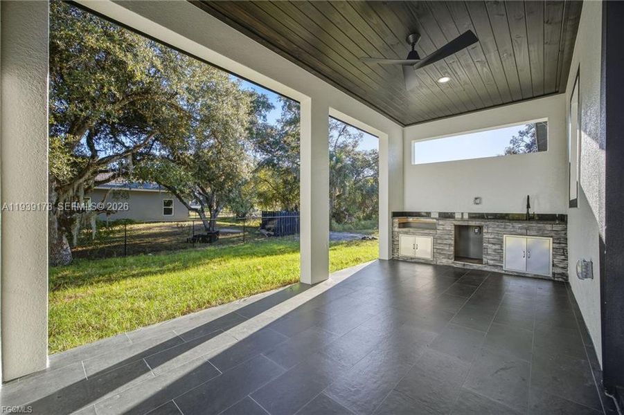Exterior details and patio area of a home in , Labelle (Image 24).