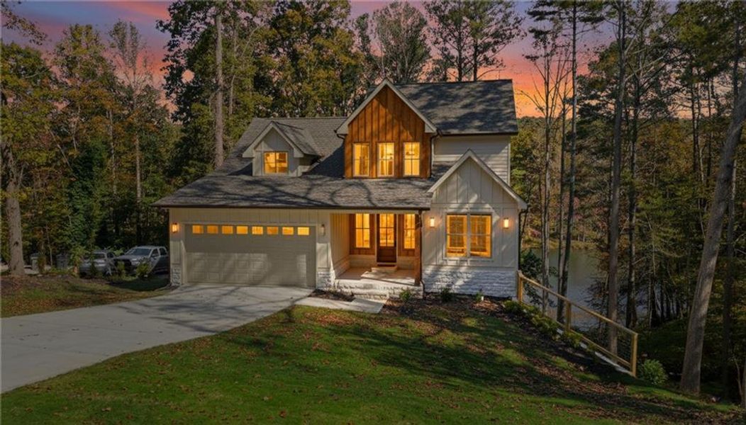 Front exterior of a new home in , Ball Ground, GA, highlighting curb appeal (Image 1). Front exterior of a new home in , Ball Ground, GA, highlighting curb appeal (Image 1).