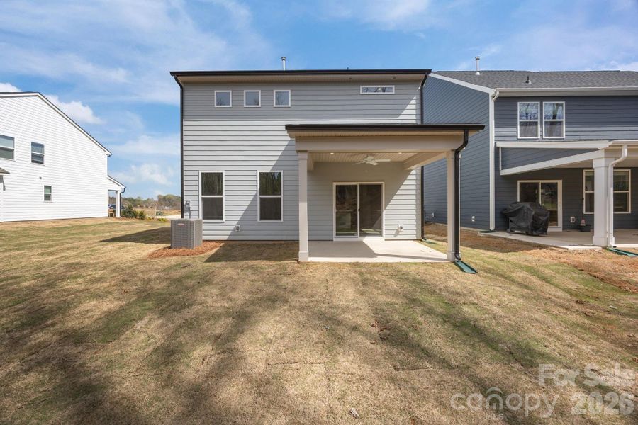 Exterior details and patio area of a home in Farms at Bellingham, Mooresville (Image 3).
