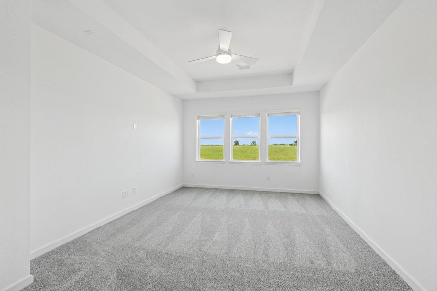 Spacious primary suite (*Photo not of actual home and used for illustration purposes only.)