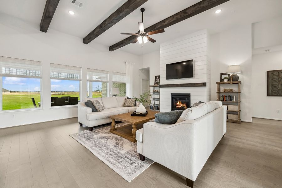 Great room with optional fireplace and optional stained ceiling beams Great room with optional fireplace and optional stained ceiling beams