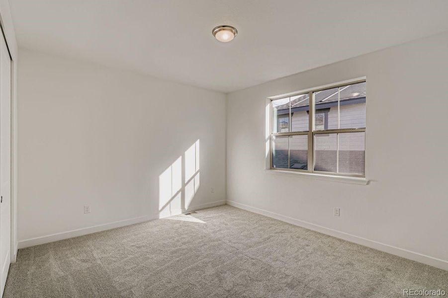 Spacious, unfurnished interior of a new home in Red Rocks Ranch: The Grand Collection, Morrison (Image 8).