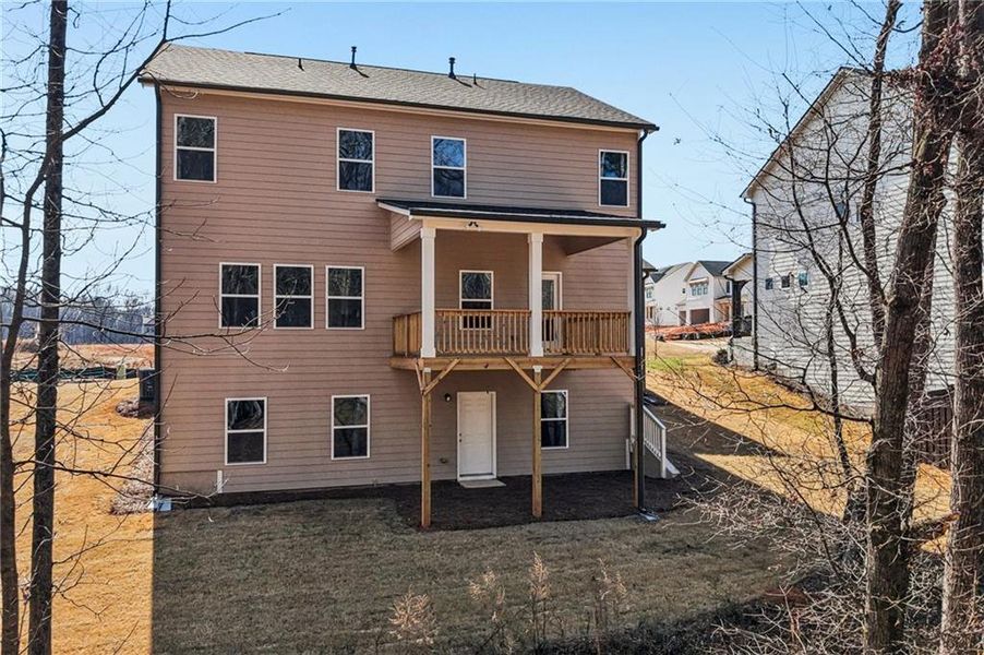 Exterior details and patio area of a home in Rosewood Lake Estates, Hoschton (Image 37).