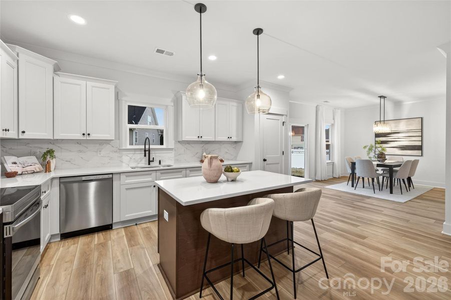 Furnished interior view inside a new home in , Charlotte (Image 5). Furnished interior view inside a new home in , Charlotte (Image 5).