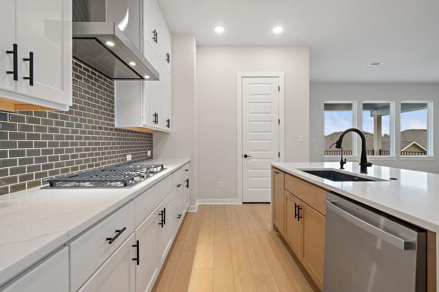 Furnished interior view inside a new home in Park Collection at Lariat, Liberty Hill (Image 7). Furnished interior view inside a new home in Park Collection at Lariat, Liberty Hill (Image 7).