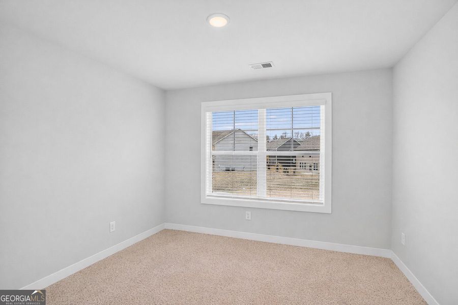 Spacious, unfurnished interior of a new home in The Fairways at Mirror Lake, Villa Rica (Image 51). Spacious, unfurnished interior of a new home in The Fairways at Mirror Lake, Villa Rica (Image 51).