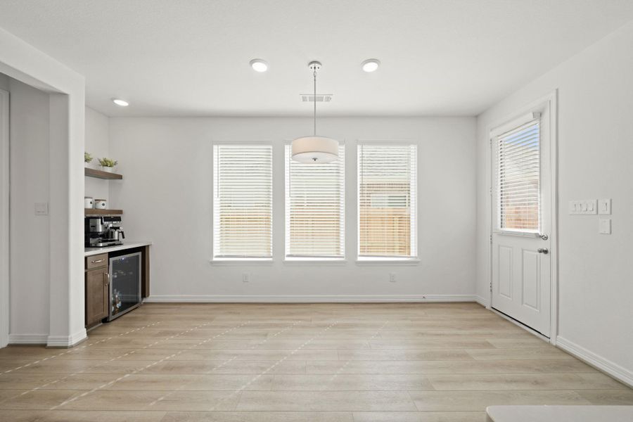 The Breakfast/Dining area enjoys ample room for larger dining tables.