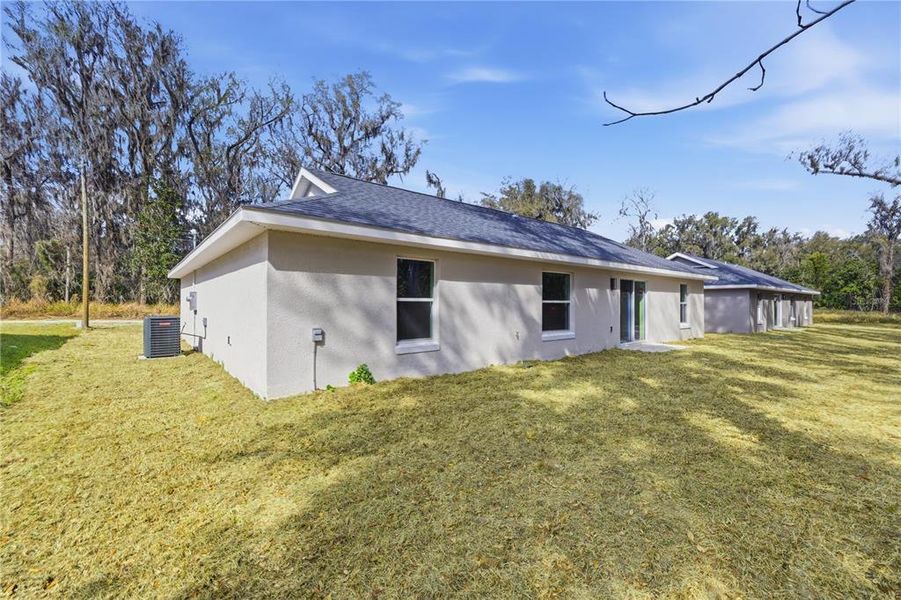 Exterior details and patio area of a home in , Summerfield (Image 3).