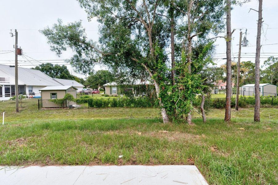 Front exterior of a new home in , Vero Beach, FL, highlighting curb appeal (Image 18). Front exterior of a new home in , Vero Beach, FL, highlighting curb appeal (Image 18).