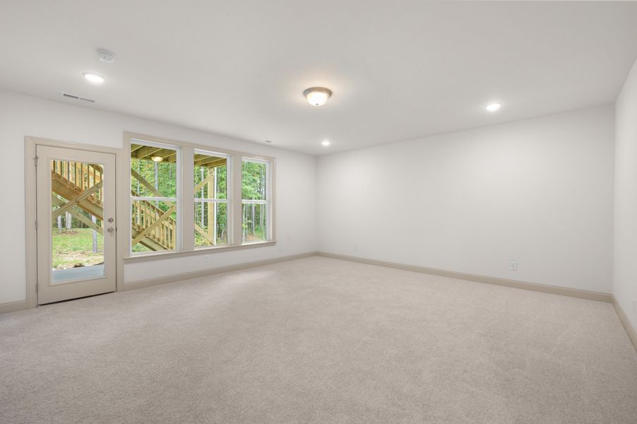 Representative unfurnished interior of a home built from the The Hampton by RobuckHomes in Baylee Ridge, Selma (Image 196).