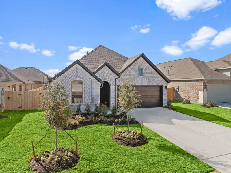 Front exterior of a new home in , Spring, TX, highlighting curb appeal (Image 2). Front exterior of a new home in , Spring, TX, highlighting curb appeal (Image 2).